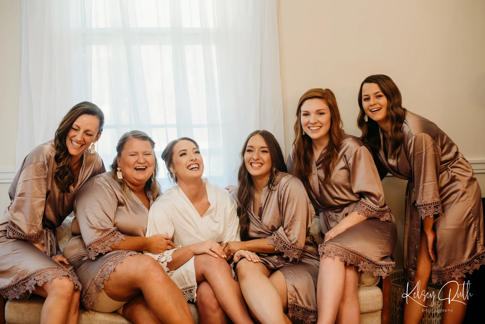 bride tribe laughing