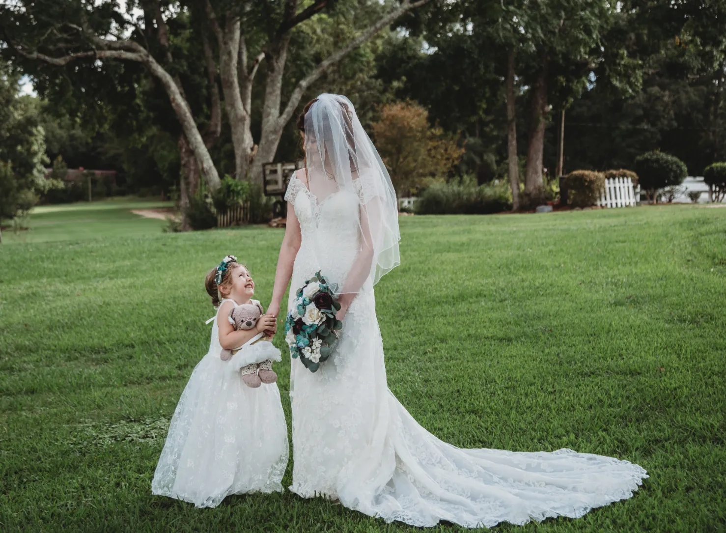 bride with flower girl