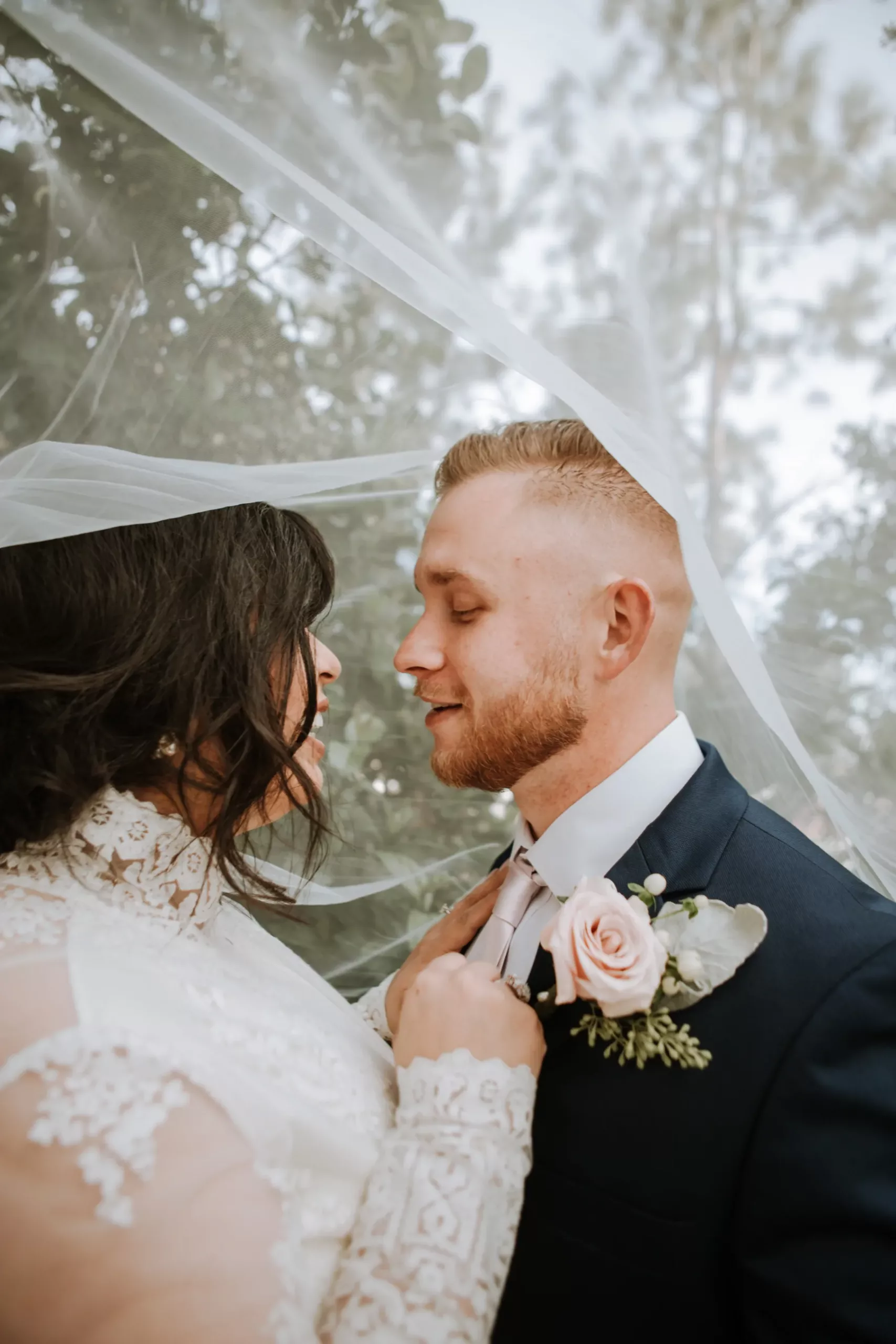 wedding couple taking portrait shots